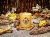 Candle-and-herbs-over-a-Celtic-patterned-cloth.jpeg